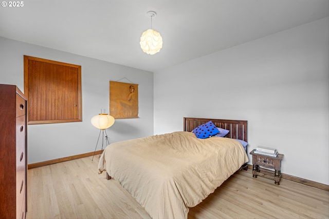 3905 NE Holman St, Portland, OR 97211 - bedroom with wood finished floors and baseboards