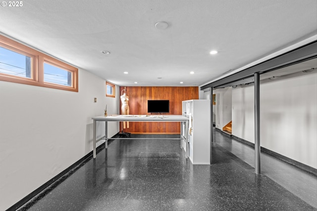 3905 NE Holman St, Portland, OR 97211 - kitchen featuring recessed lighting, baseboards, and brown cabinetry