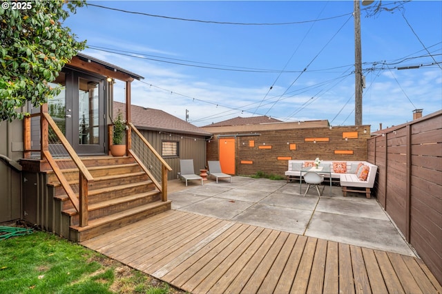3905 NE Holman St, Portland, OR 97211 - deck with a patio, a fenced backyard, and an outdoor hangout area