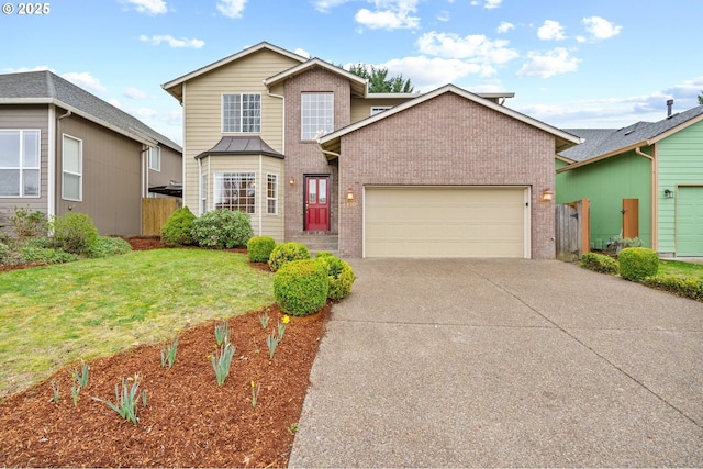 traditional-style home featuring a garage, fence, driveway, and brick siding