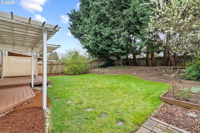 view of yard featuring a fenced backyard, a pergola, a vegetable garden, and a wooden deck