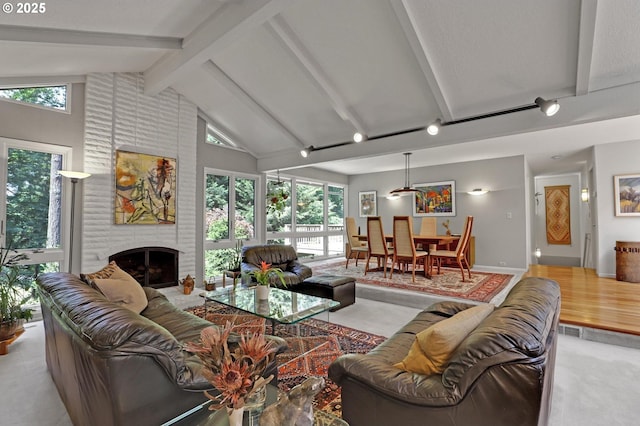 128 Del Prado St, Lake Oswego, OR 97035 - living area with beamed ceiling, high vaulted ceiling, and a fireplace