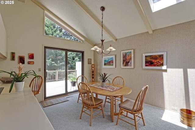 128 Del Prado St, Lake Oswego, OR 97035 - carpeted dining space with beamed ceiling, a chandelier, and high vaulted ceiling