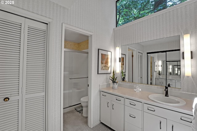 128 Del Prado St, Lake Oswego, OR 97035 - bathroom with a closet, wallpapered walls, a shower stall, and vanity