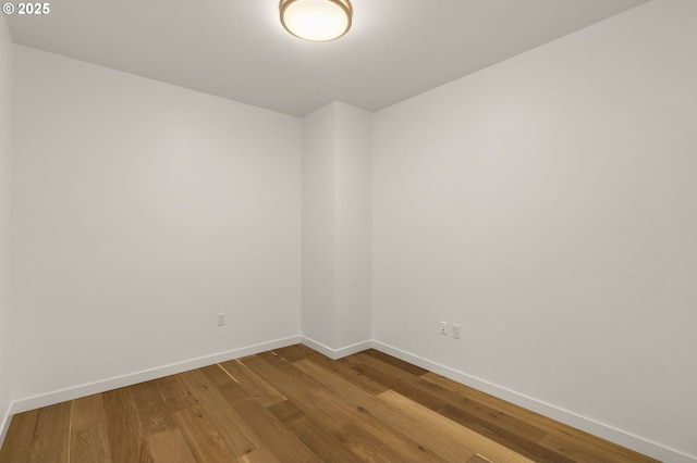 590 Waterfront Way Unit 500, Vancouver, WA 98660 - unfurnished room featuring baseboards and dark wood-style flooring