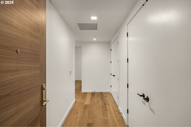 590 Waterfront Way Unit 500, Vancouver, WA 98660 - hallway featuring light wood-style floors, baseboards, and recessed lighting
