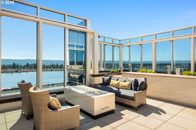 590 Waterfront Way Unit 500, Vancouver, WA 98660 - sunroom / solarium featuring tile patterned flooring and a water view