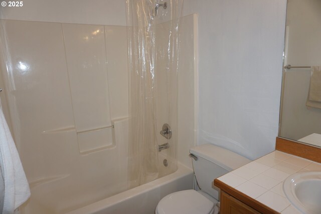 full bath with vanity, toilet, and shower / tub combo