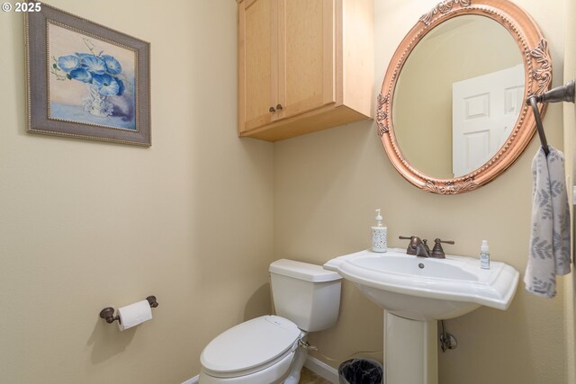 bathroom featuring toilet