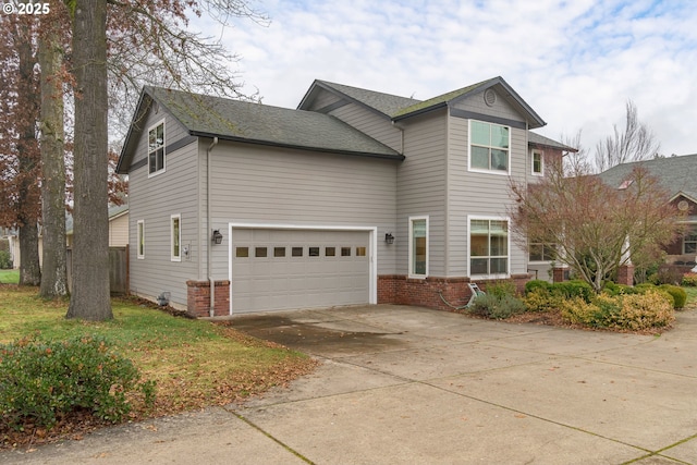 front of property with a garage