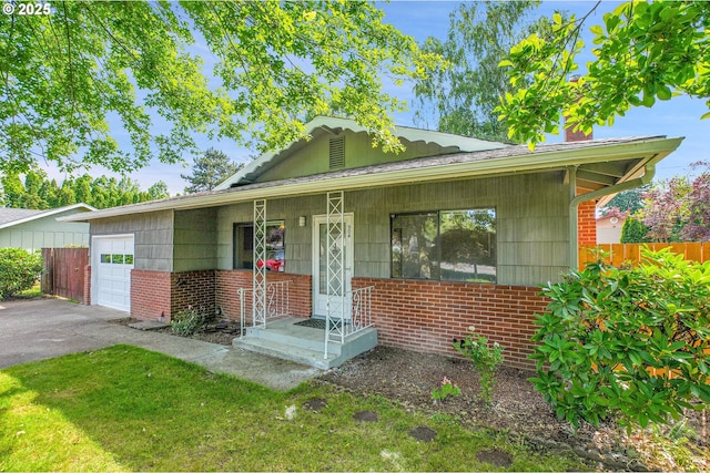 904 SE 223rd Ave, Gresham, OR 97030 - view of front of property with a garage, brick siding, and asphalt driveway