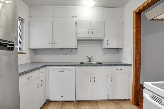 904 SE 223rd Ave, Gresham, OR 97030 - kitchen featuring dishwasher, freestanding refrigerator, extractor fan, and white cabinets