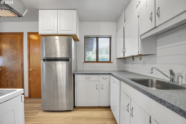 904 SE 223rd Ave, Gresham, OR 97030 - kitchen with freestanding refrigerator, white dishwasher, white cabinetry, and light wood-type flooring