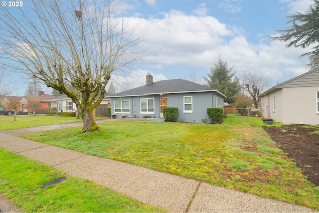 ranch-style home with a front yard