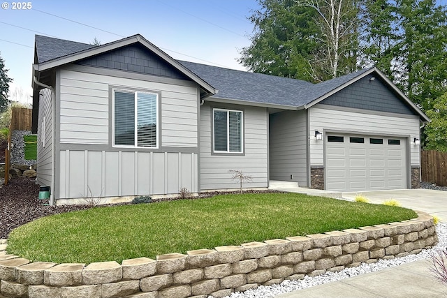 single story home featuring fence, driveway, an attached garage, a front lawn, and board and batten siding