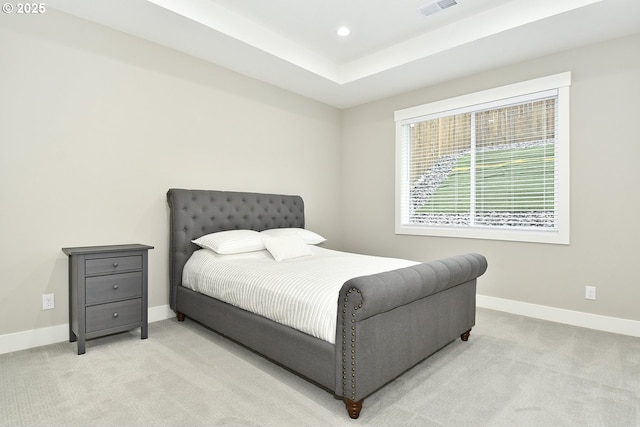 bedroom with recessed lighting, baseboards, and light carpet