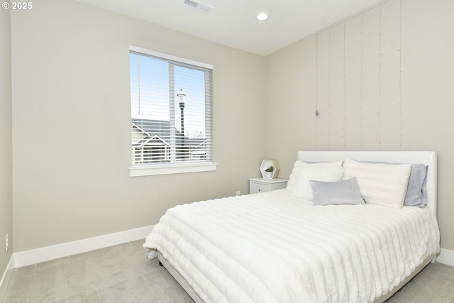 carpeted bedroom with visible vents, recessed lighting, and baseboards