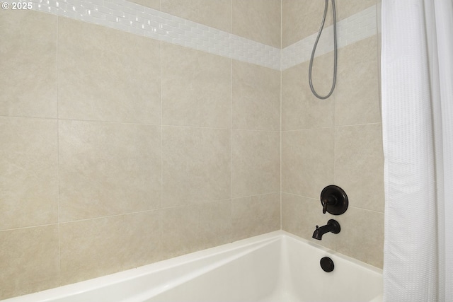 bathroom featuring shower / bath combination with curtain