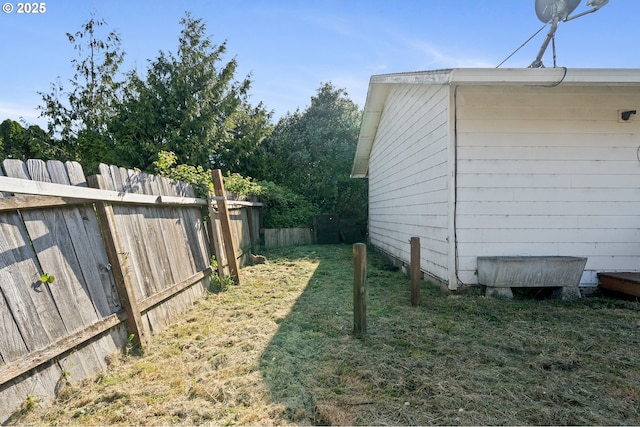 1806 8th St, Tillamook, OR 97141 - view of side of property with a yard and a fenced backyard