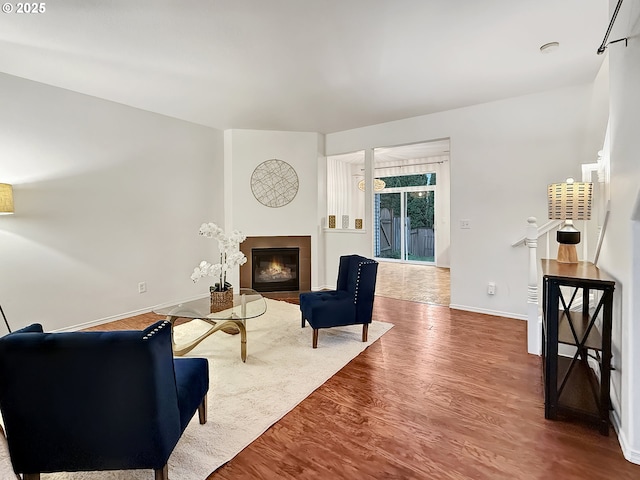 21069 SW Madeira Ter, Sherwood, OR 97140 - living room with a fireplace and wood finished floors