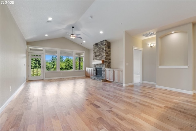 5809 NW 26th Ave, Camas, WA 98607 - unfurnished living room featuring a ceiling fan, a stone fireplace, vaulted ceiling, light wood finished floors, and recessed lighting
