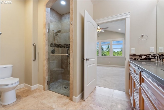 5809 NW 26th Ave, Camas, WA 98607 - full bathroom with a shower stall, ceiling fan, tile patterned floors, vanity, and lofted ceiling