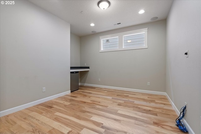 5809 NW 26th Ave, Camas, WA 98607 - unfurnished room with wood finished floors and recessed lighting