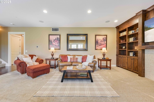 7705 NW Quinault St, Camas, WA 98607 - living area featuring visible vents, baseboards, recessed lighting, stairs, and light colored carpet