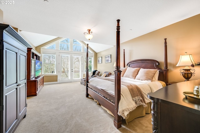 7705 NW Quinault St, Camas, WA 98607 - bedroom featuring french doors, light carpet, access to exterior, and lofted ceiling