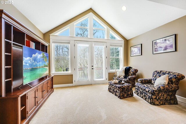 7705 NW Quinault St, Camas, WA 98607 - sitting room featuring light carpet, french doors, baseboards, and vaulted ceiling
