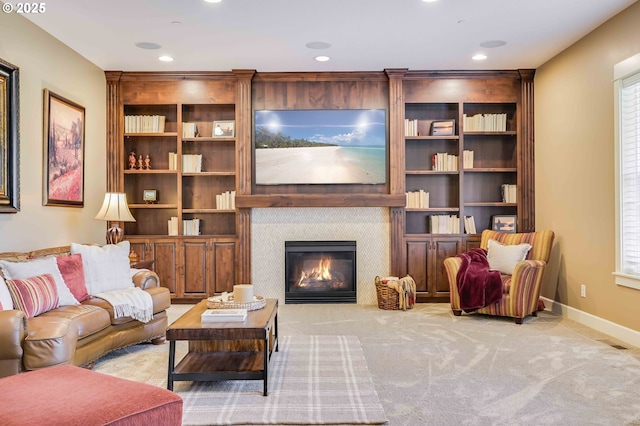 7705 NW Quinault St, Camas, WA 98607 - carpeted living room with recessed lighting, a fireplace, and baseboards