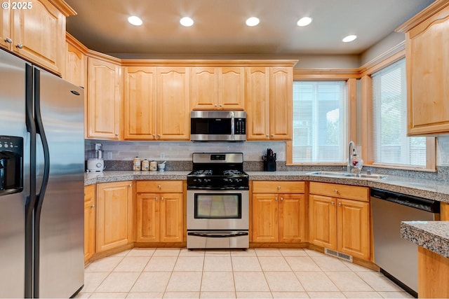 16710 NE 5th St, Vancouver, WA 98684 - kitchen with appliances with stainless steel finishes, a sink, tile counters, tasteful backsplash, and recessed lighting