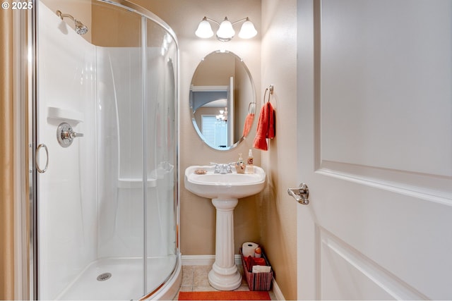 16710 NE 5th St, Vancouver, WA 98684 - bathroom featuring a shower stall, tile patterned flooring, and baseboards