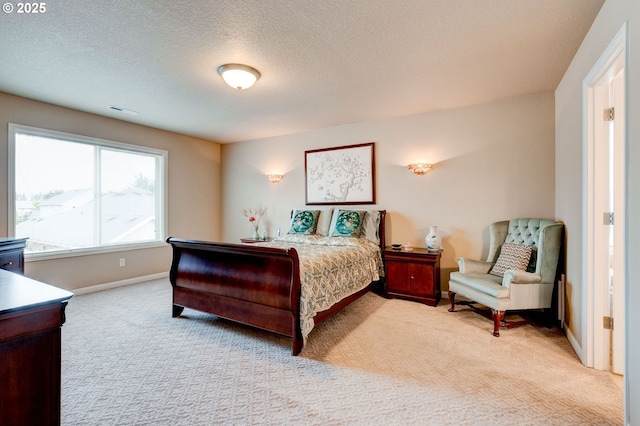 16710 NE 5th St, Vancouver, WA 98684 - bedroom featuring light carpet, baseboards, and a textured ceiling