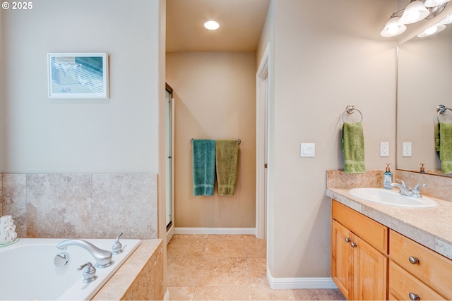 16710 NE 5th St, Vancouver, WA 98684 - full bathroom featuring vanity, a bath, a shower stall, tile patterned flooring, and baseboards