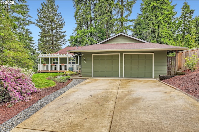 6650 SW Dale Ave, Beaverton, OR 97008 - view of front of property with a garage, roof with shingles, and a pergola