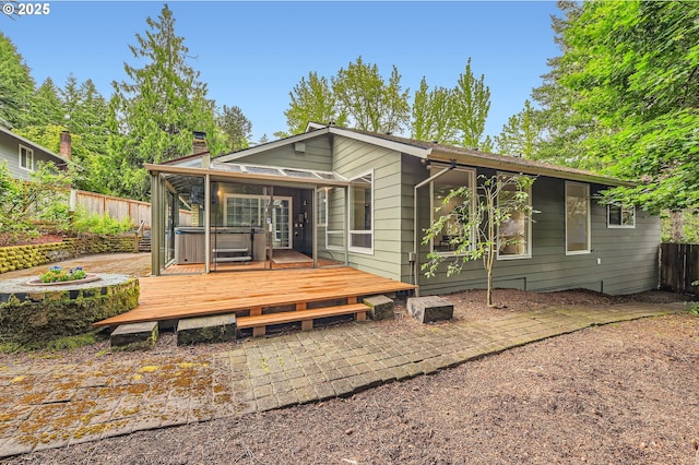 6650 SW Dale Ave, Beaverton, OR 97008 - back of property with a fenced backyard, a chimney, and a deck