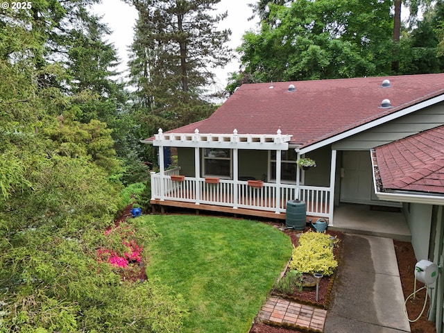6650 SW Dale Ave, Beaverton, OR 97008 - rear view of property featuring a pergola, roof with shingles, a wooden deck, and a lawn