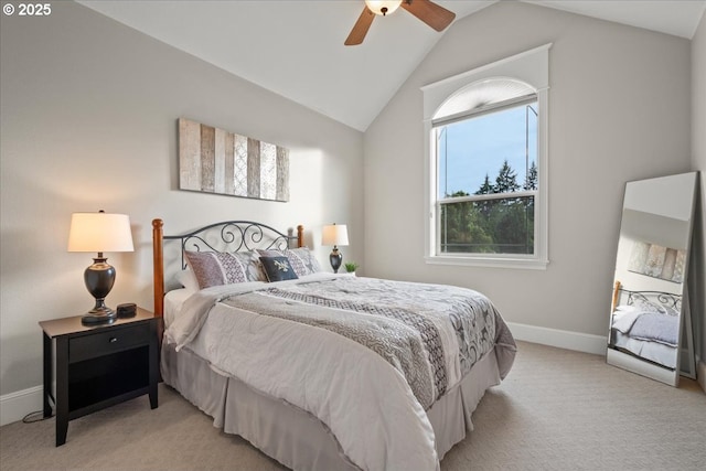 904 NE 224th Cir, Ridgefield, WA 98642 - bedroom featuring light carpet, vaulted ceiling, baseboards, and a ceiling fan