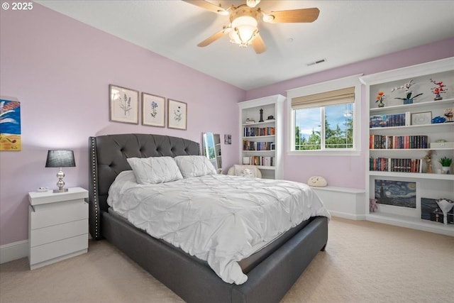904 NE 224th Cir, Ridgefield, WA 98642 - bedroom with light carpet, a ceiling fan, and baseboards