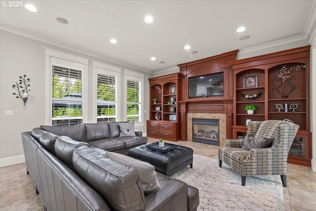 904 NE 224th Cir, Ridgefield, WA 98642 - living area with crown molding, recessed lighting, a premium fireplace, baseboards, and light tile patterned flooring