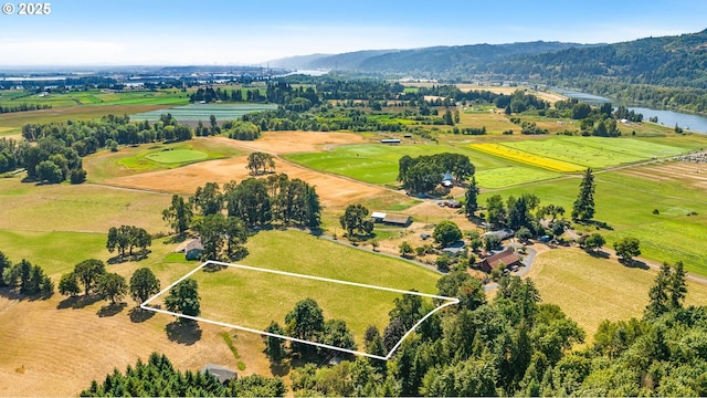 aerial view featuring a rural view and a water view