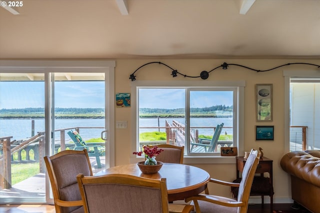 57569 Parkersburg Rd, Bandon, OR 97411 - dining area featuring a water view and wood finished floors