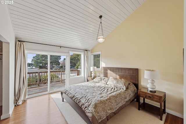 bedroom featuring high vaulted ceiling, access to exterior, light wood-type flooring, and wood ceiling