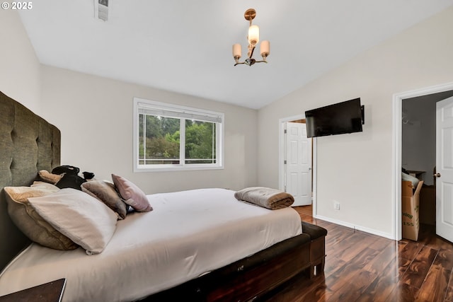 2280 Dakota St, Eugene, OR 97402 - bedroom with wood finished floors, a chandelier, vaulted ceiling, and baseboards