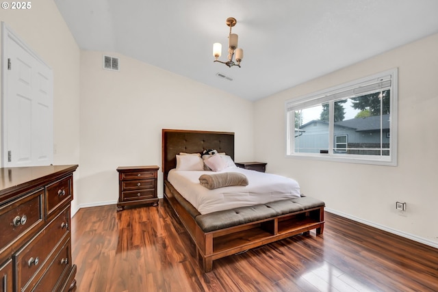 2280 Dakota St, Eugene, OR 97402 - bedroom with vaulted ceiling, wood finished floors, a chandelier, and baseboards