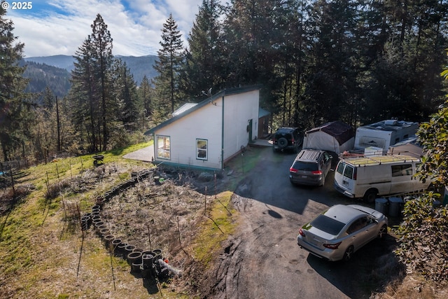 view of side of property featuring a mountain view