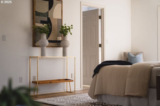 bedroom featuring wood finished floors