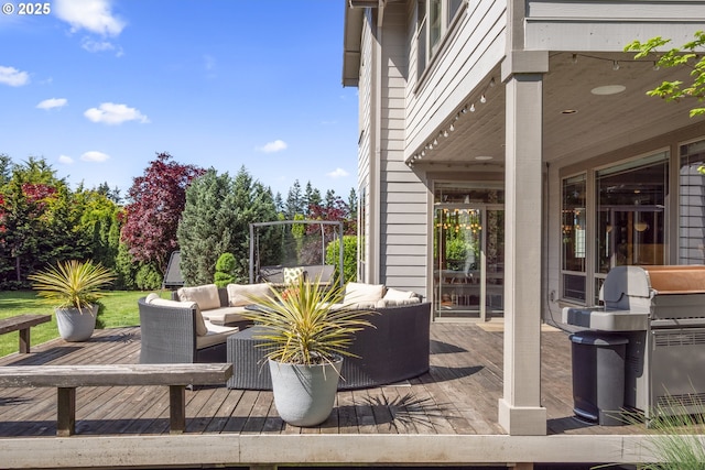 view of patio / terrace with an outdoor hangout area, a deck, and a grill