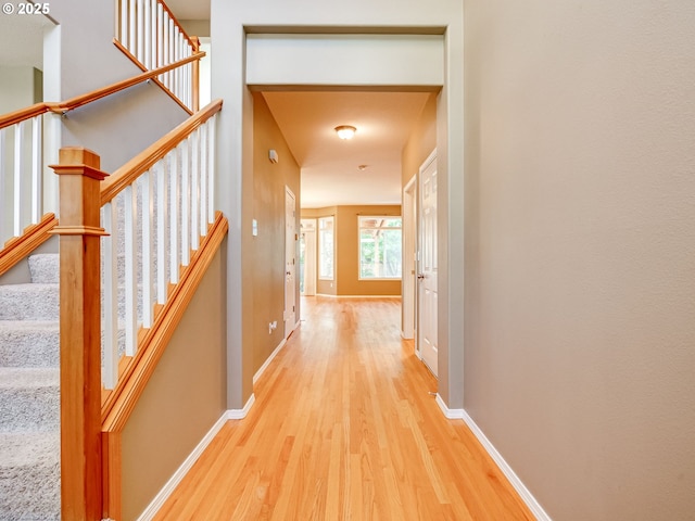 2104 NE 180th Pl, Vancouver, WA 98684 - corridor featuring wood finished floors, baseboards, and stairway